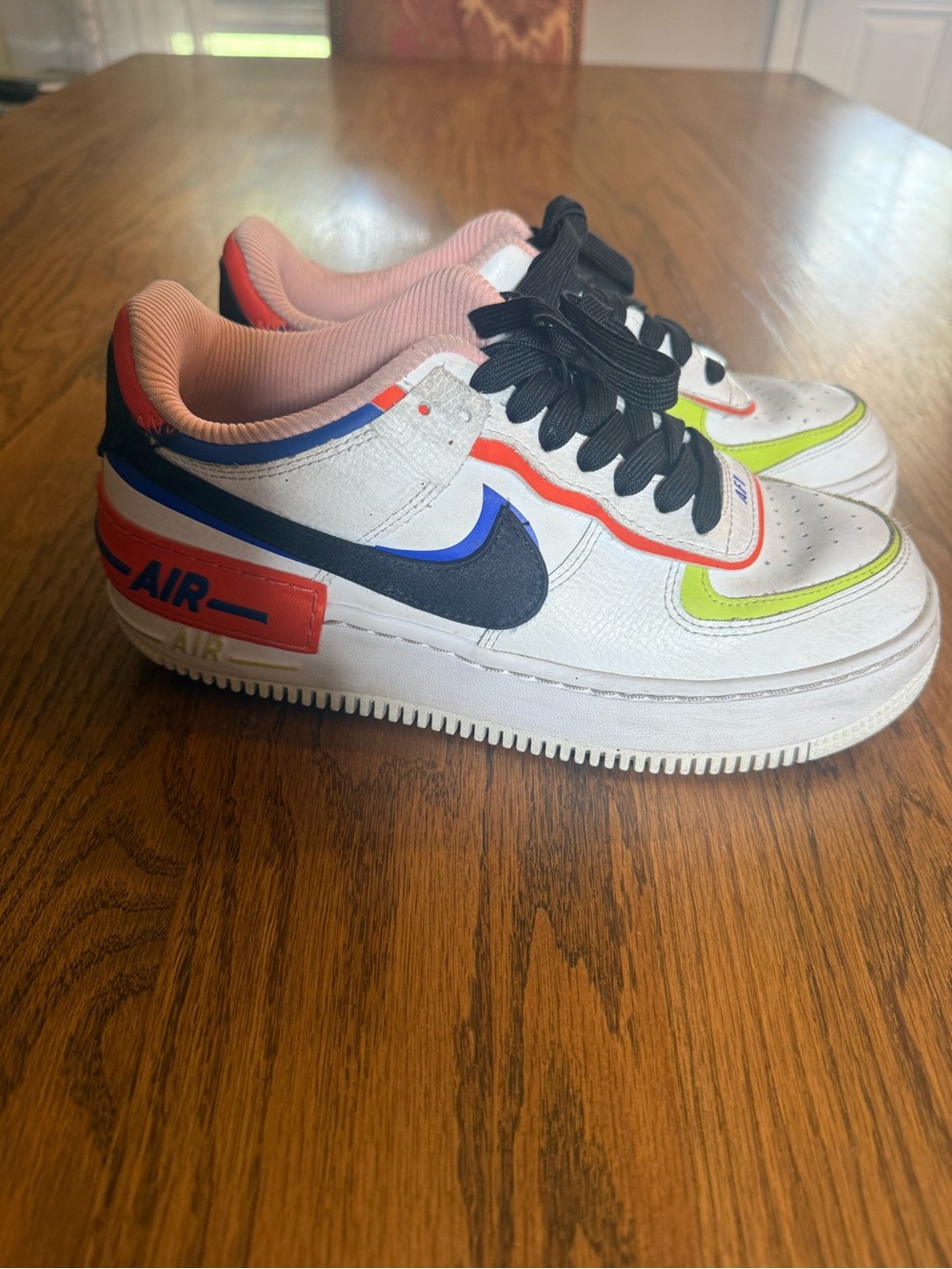 Nike White Low-Top Sneakers with Black Swoosh and Neon Accents